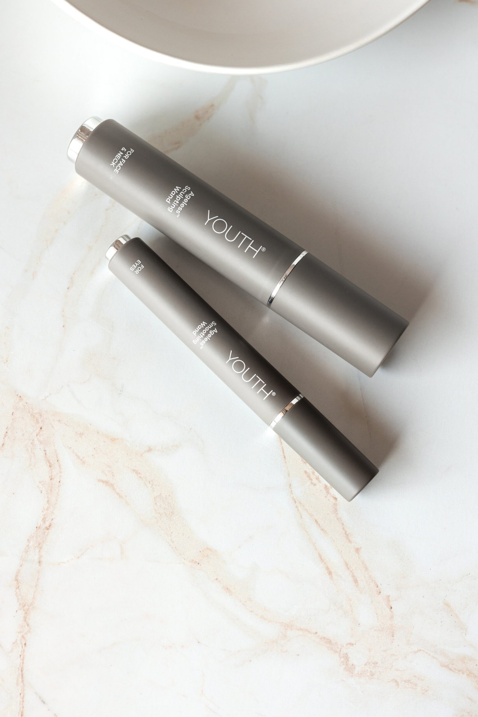 Shaklee YOUTH Ageless peptide wands for face and eyes on marble